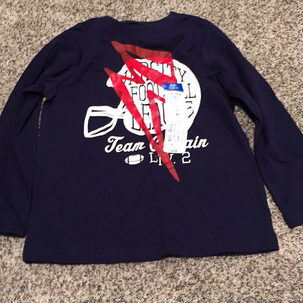 Boys Varsity Football long sleeve shirt.